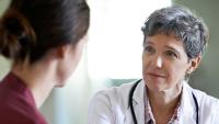 Doctor talking to patient.
